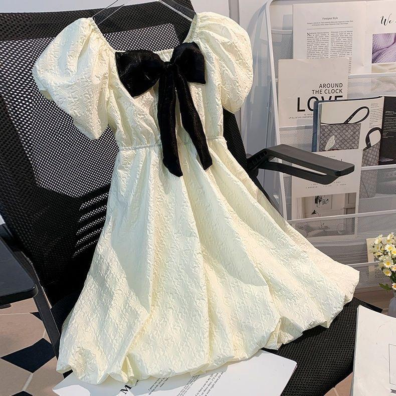 DONGSHOP HOT Cô gái bong bóng nước ngoài tay áo đầm mùa hè 2023 Hàn Quốc trẻ em Bowknot váy công chúa váy mùa hè