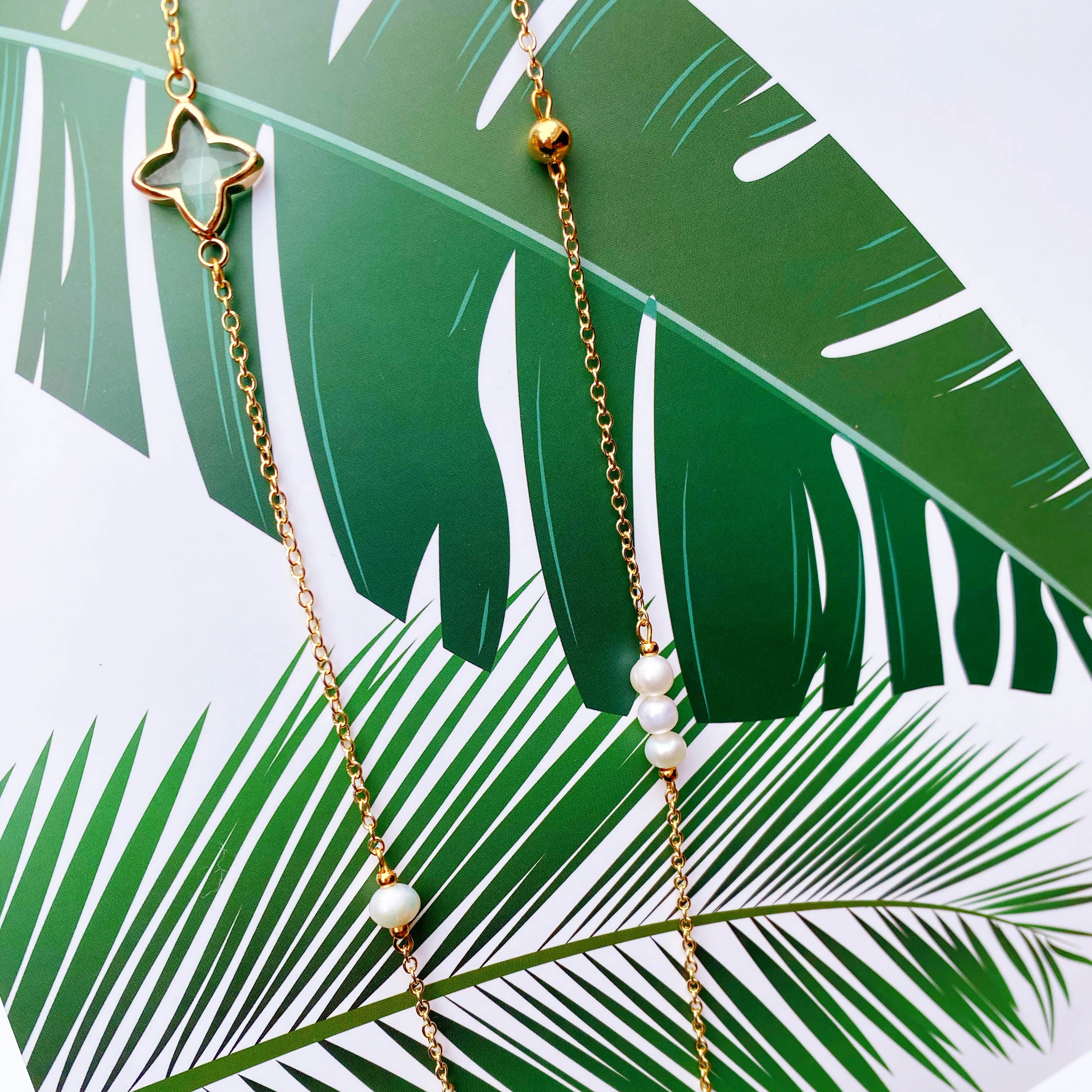 Dây kính chuỗi đeo gọng kính mix cỏ bốn lá và hạt châu không đối xứng ấn tượng dây chuyền giữ khẩu trang và tai nghe