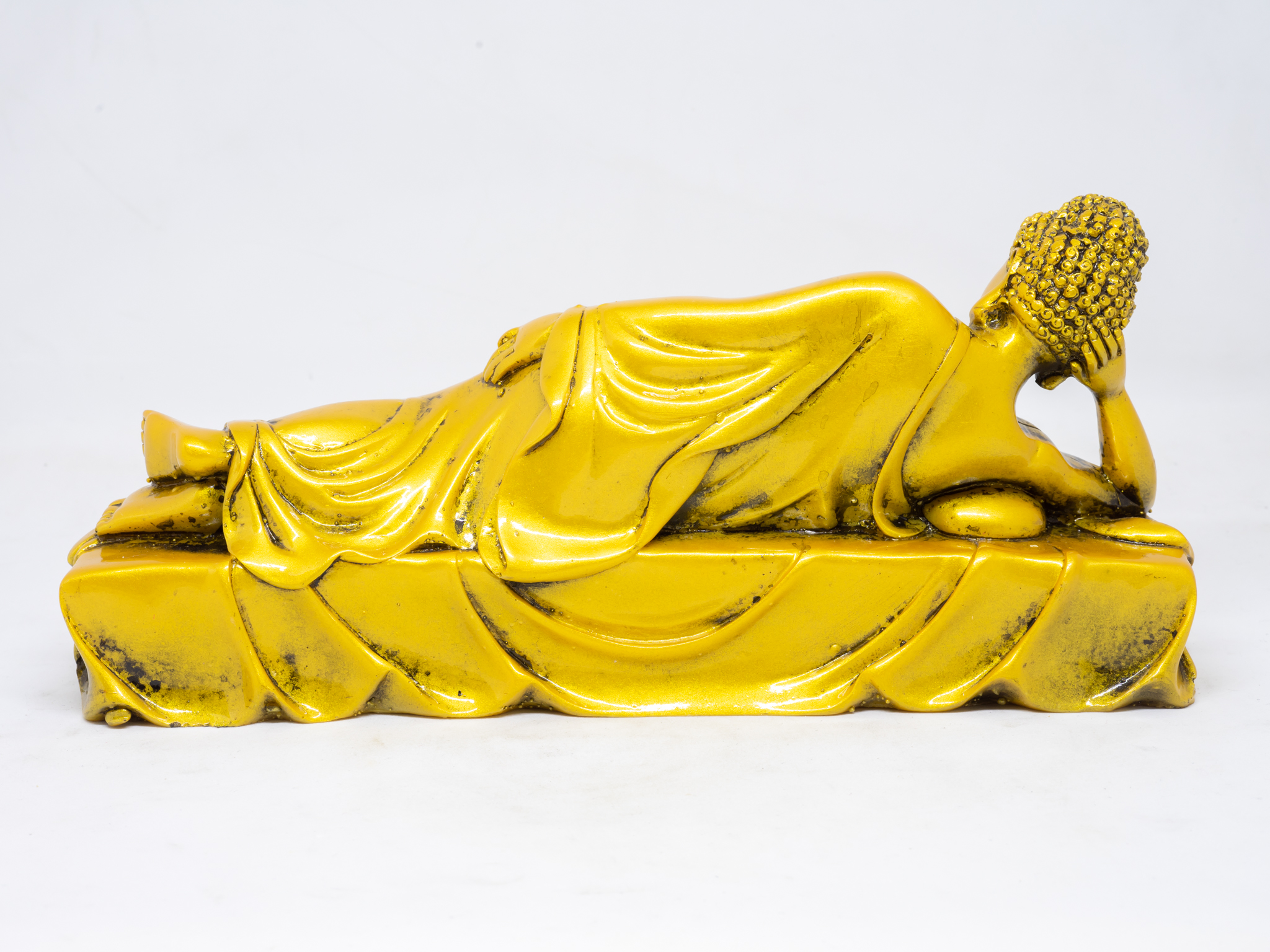 Tượng Phật Thích Ca Mâu Ni nằm nhập niết bàn bằng đá màu vàng cao 11cm