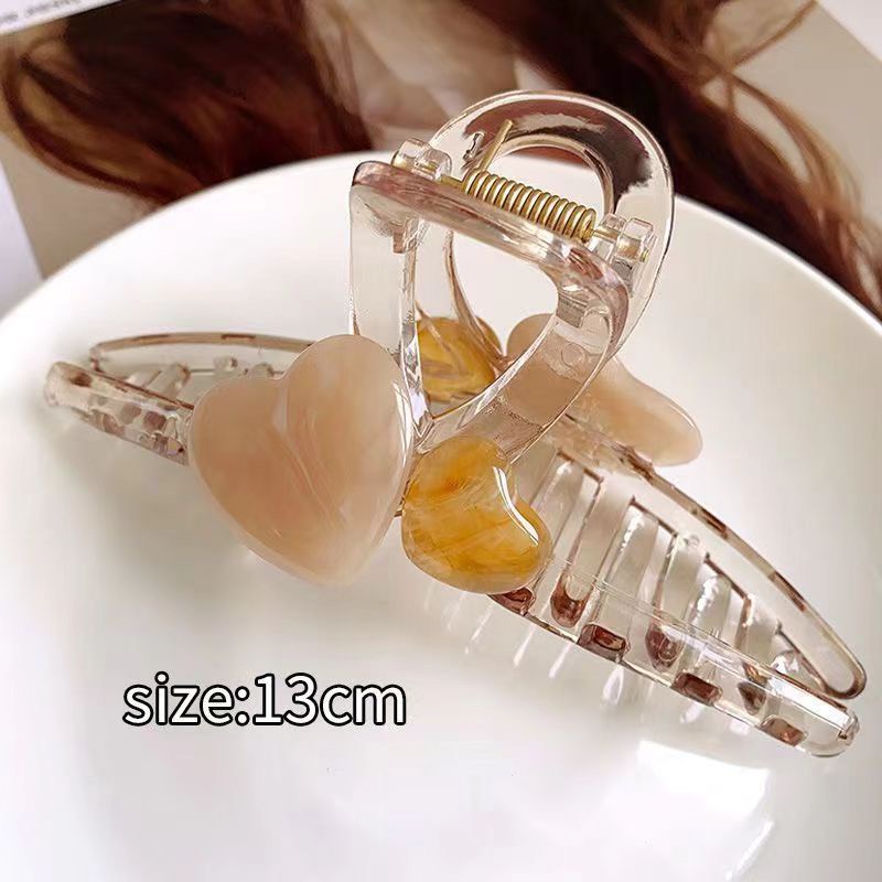 Kẹp tóc càng cua trong suốt đính trái tim