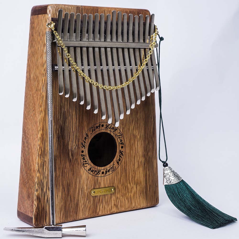 Đàn Kalimba LingTing 17 Phím Gỗ Hoàng Đàn LT-K17Y (Hộp cứng chống sốc, Búa chỉnh âm, Dây treo trang trí, Khăn lau, Sticker dán note, Sách học, Ling Ting K17Y) - Kèm Kèn Kazoo DreamMaker.