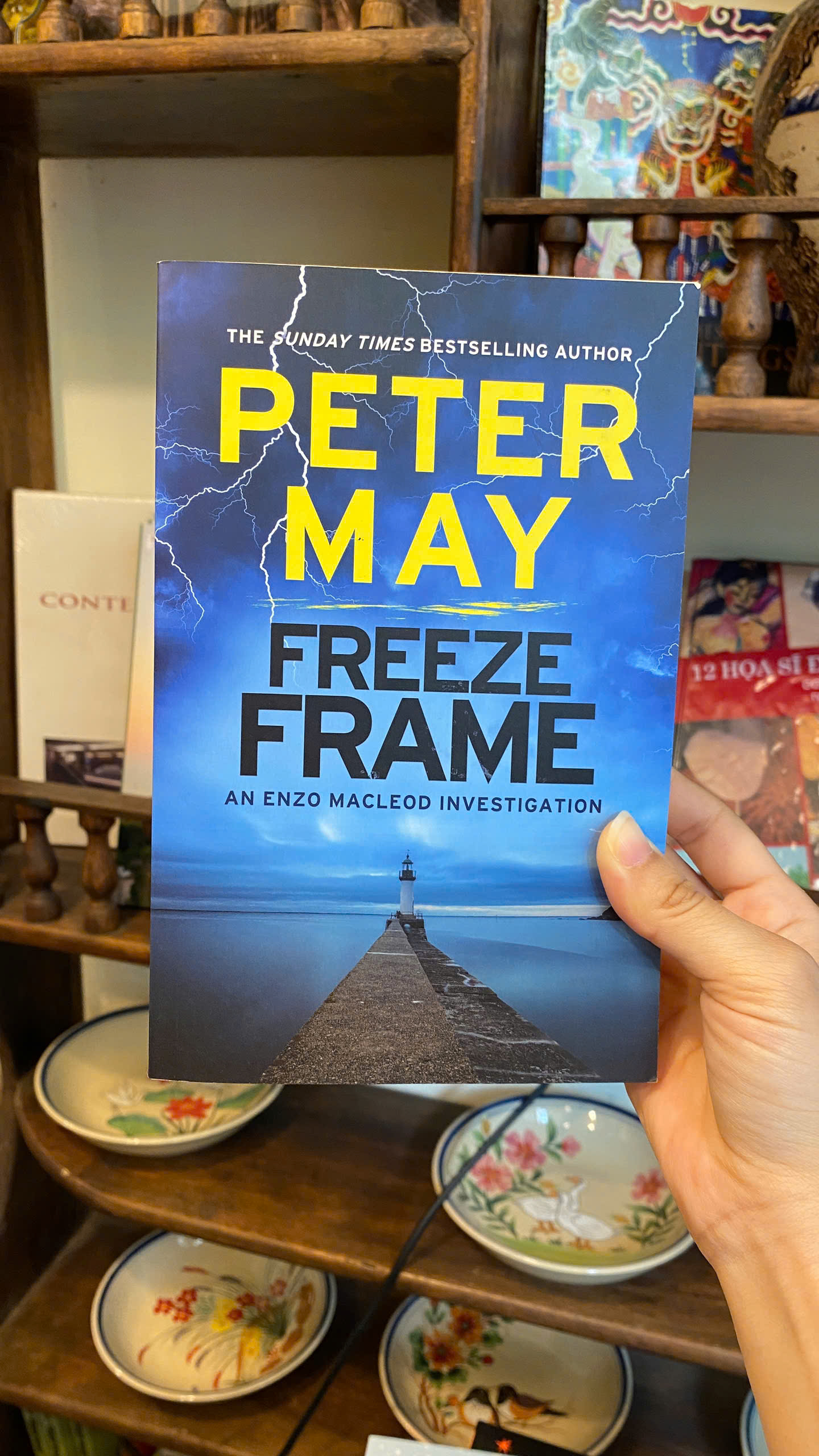 Sách - Freeze Frame (The Enzo Files) by Peter May | English Mystery Thriller - Sách ngoại văn