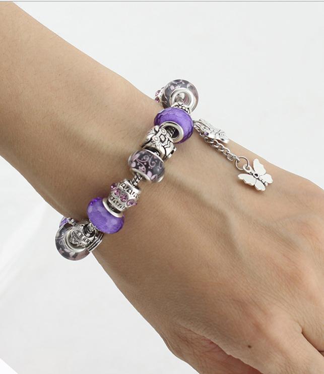 Vòng tay nữ charm tím cao cấp đính đôi bướm trắng VCH01