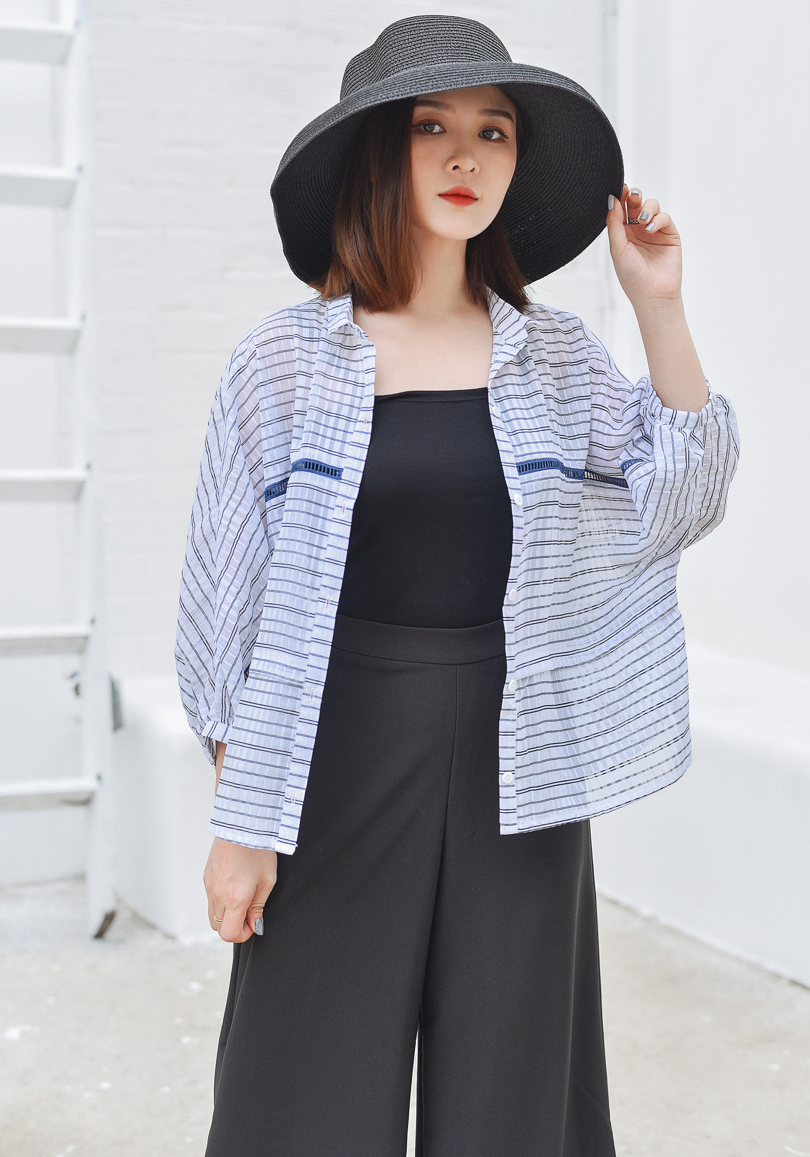 Áo sơ mi caro tay phồng lửng
