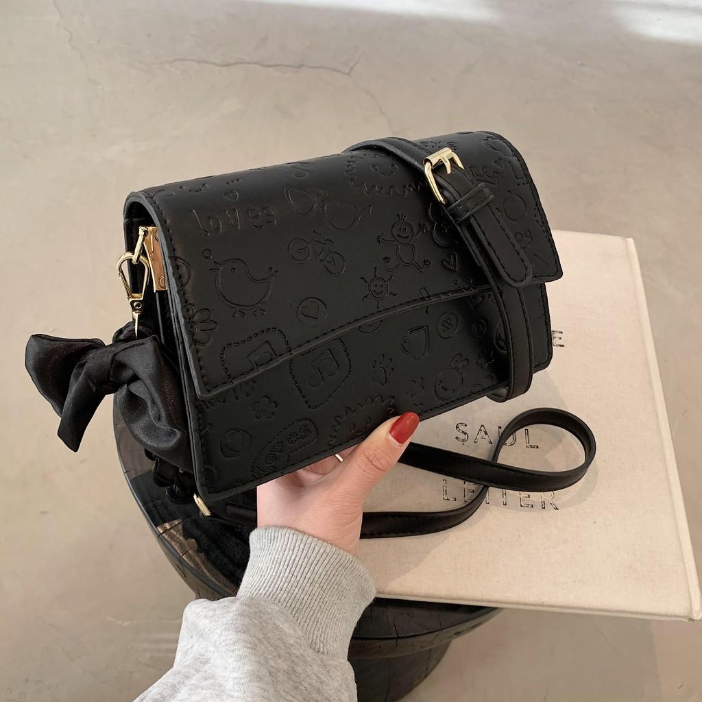 Túi da nữ họa tiết in chìm kute - MA279