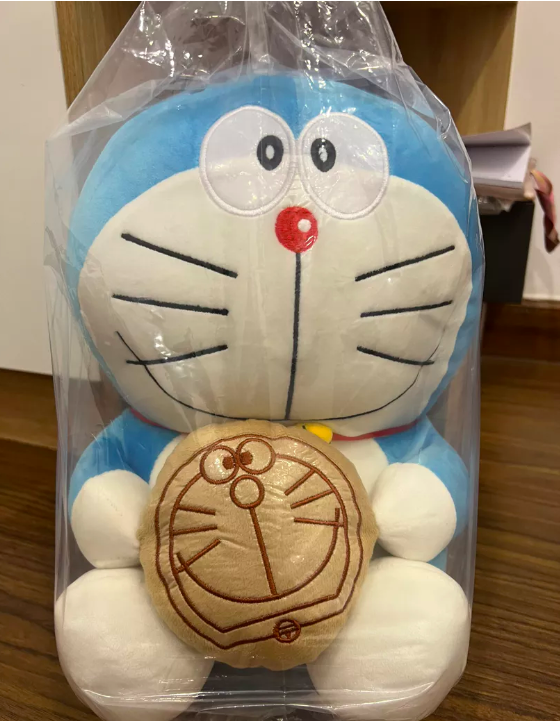 Thú nhồi bông Doraemon ôm bánh rán - Size từ 40cm đến 80cm - Quà tặng gấu bông Doraemon dễ thương