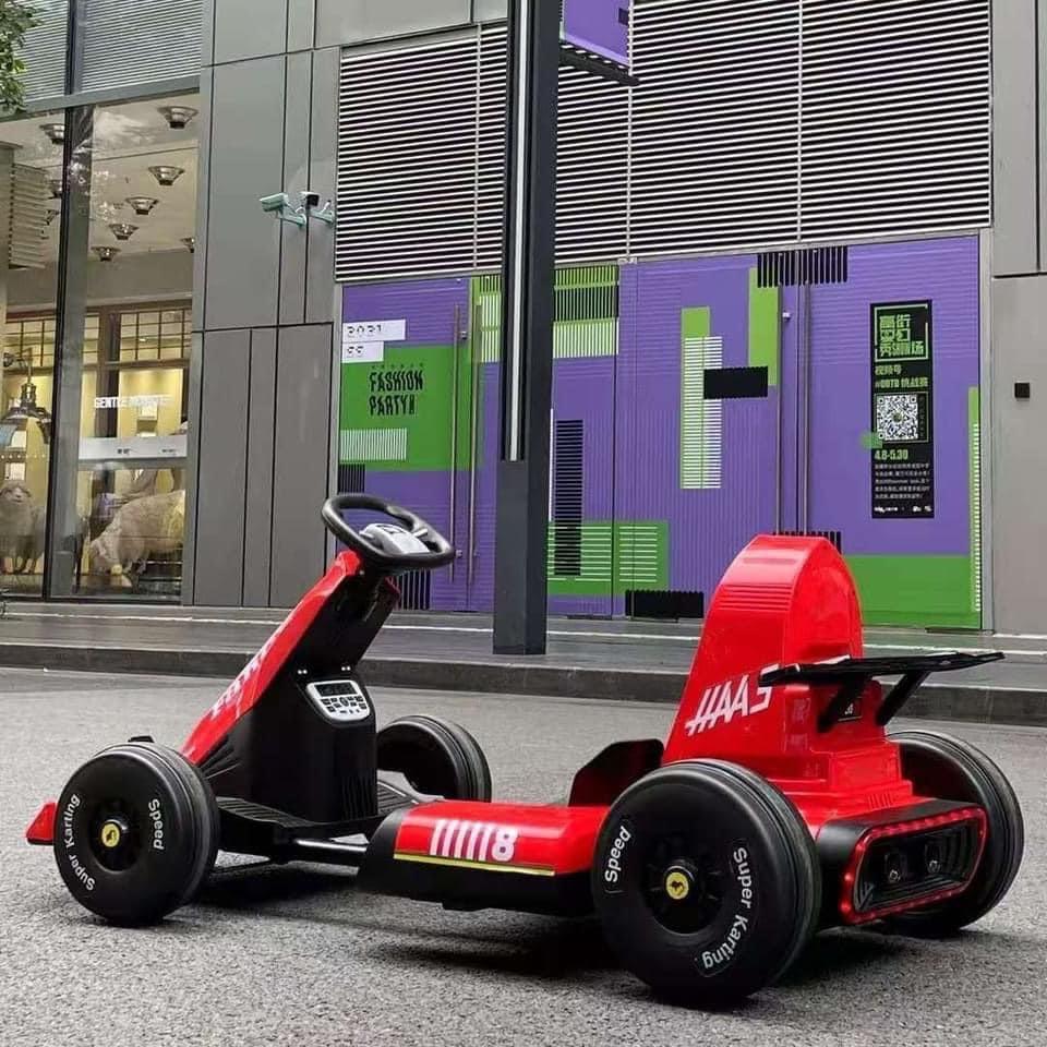 Ô tô điện trẻ em BABY - KID Kiểu dángThể Thao Drift Car F1 Cao cấp siêu ngầu 2 động cơ lớn ắc quy 12v (Đỏ-Vàng-Trắng)