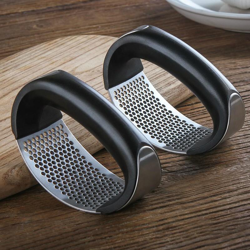 Dụng cụ ép hành tỏi cầm tay