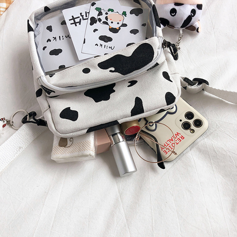 Túi đeo chéo mini con bò sữa có ngăn trong suốt không kèm móc khóa