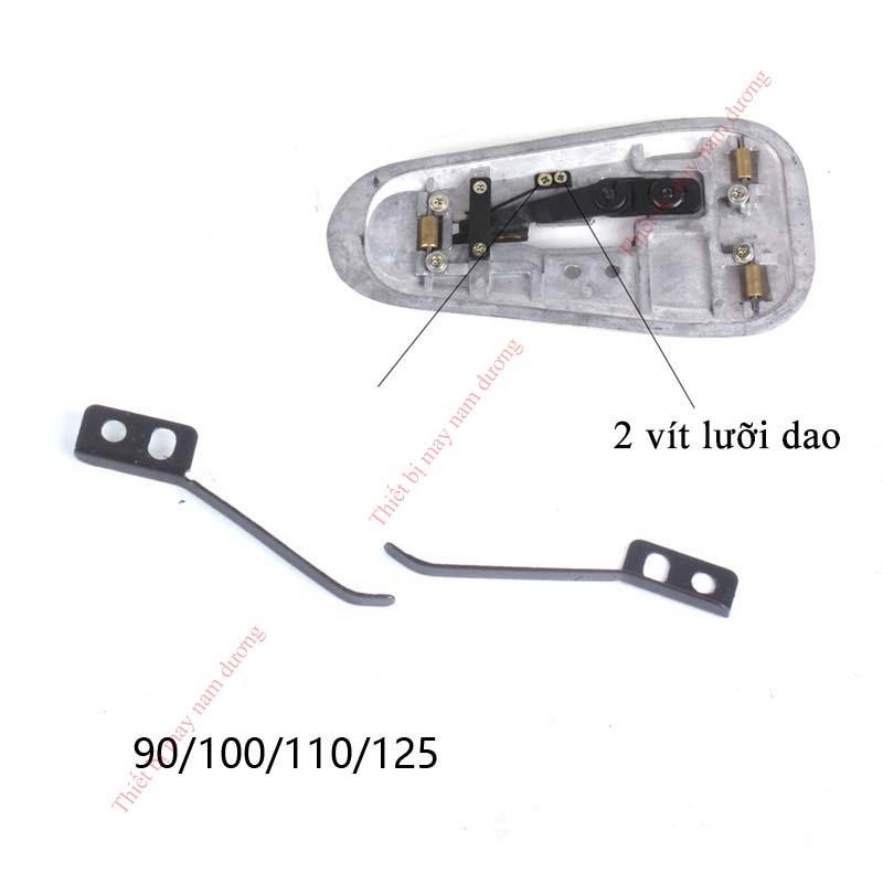 Lẫy đẩy dao dưới máy cắt vải đĩa