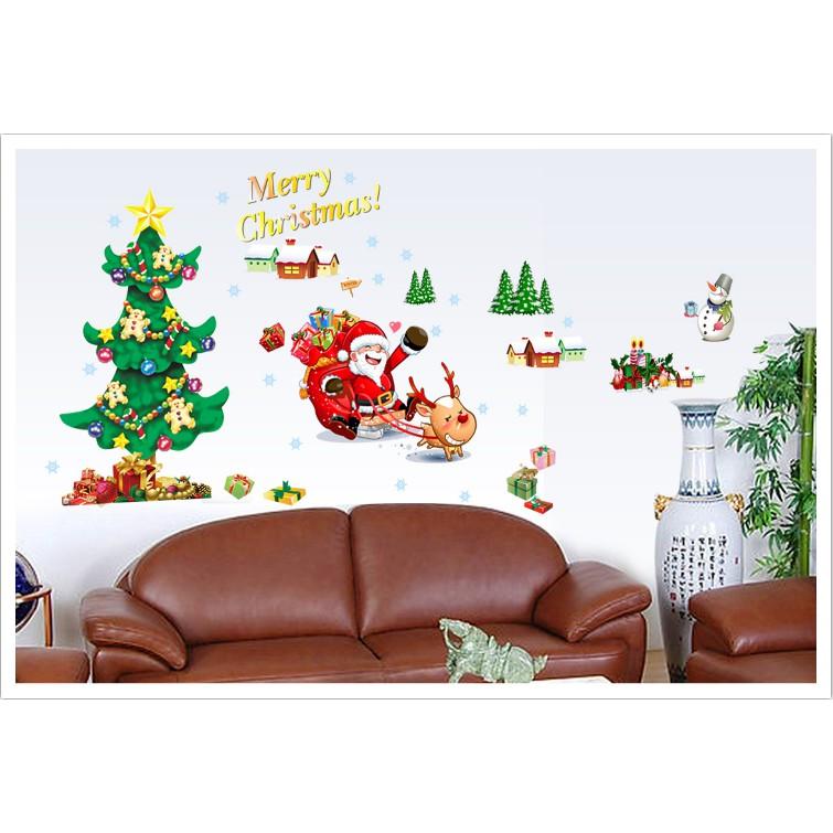 Decal trang trí Noel - Ông Gia Noel ngồi xe Tuần Lộc bay phát quà