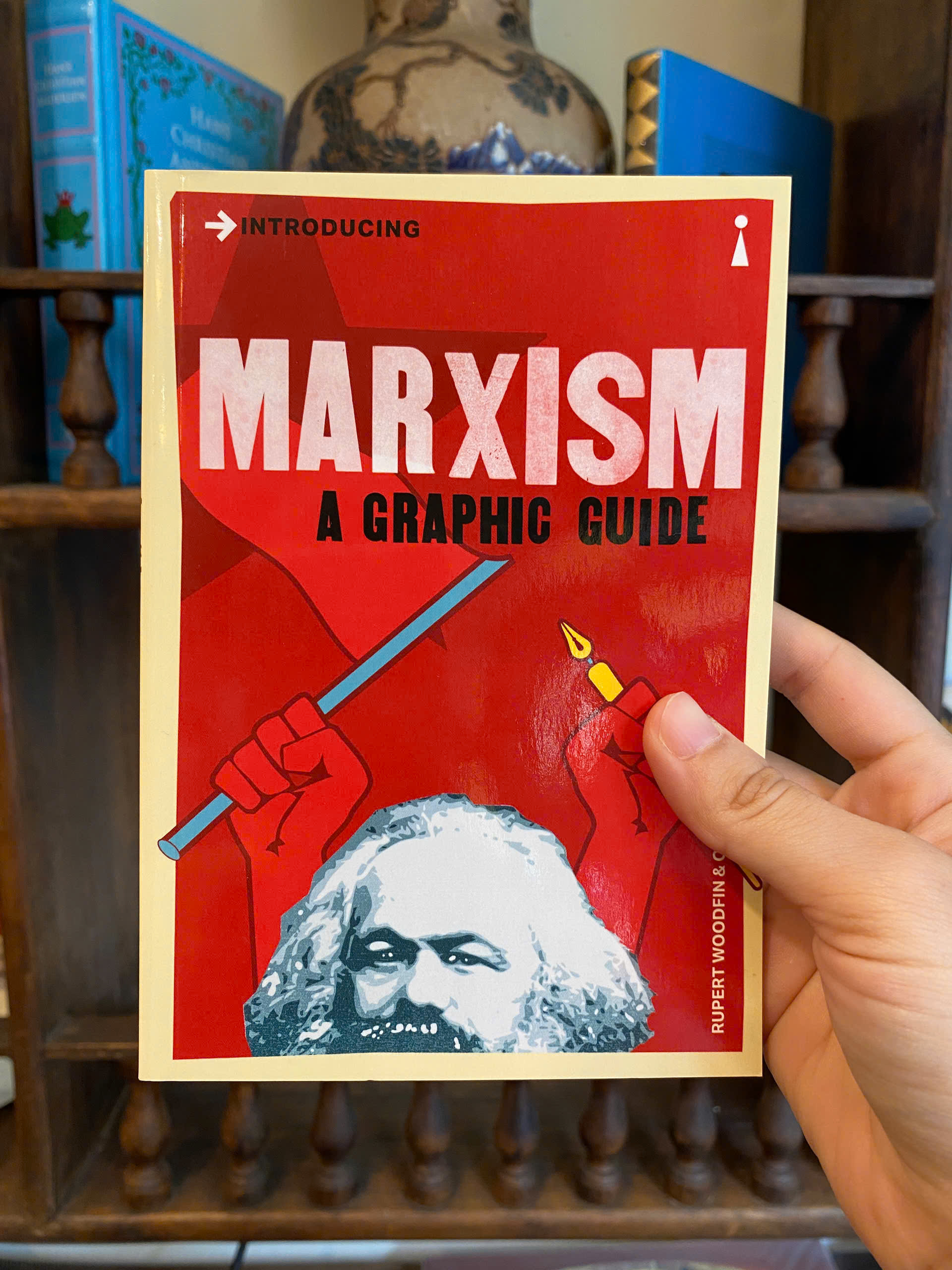 Sách - Introducing Marxism: A Graphic Guide by Rupert Woodfin | Philosophy / Biography Nonfiction