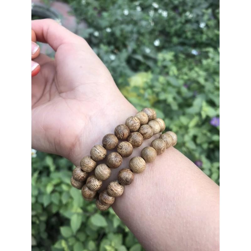 Vòng trầm hương thiên nhiên banh đỏ mix charm