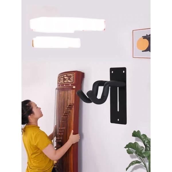 Móc treo đàn guzheng và cổ cầm trên tường