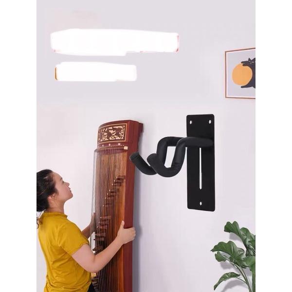 móc treo đàn guzheng và cổ cầm trên tường