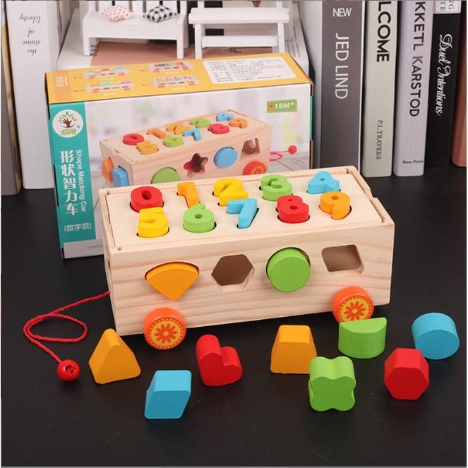 Đồ chơi xe kéo thả hình khối kết hợp số đếm, đàn và bảng phân loại hình khối bằng gỗ an toàn cho bé phát triển tư duy tr