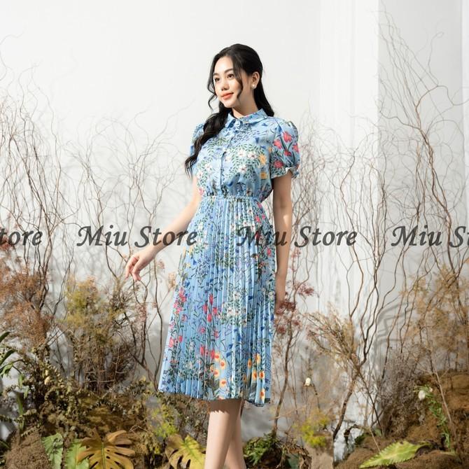 Đầm công sở thiết kế phối hoa dập ly eo thun