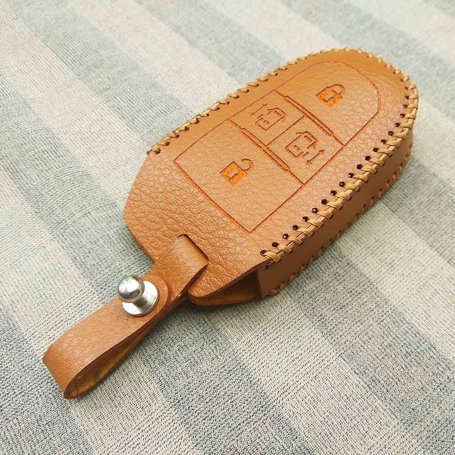 Bao da 4 nút chìa khóa smartkey cho xe hơi Peugeot Traveller