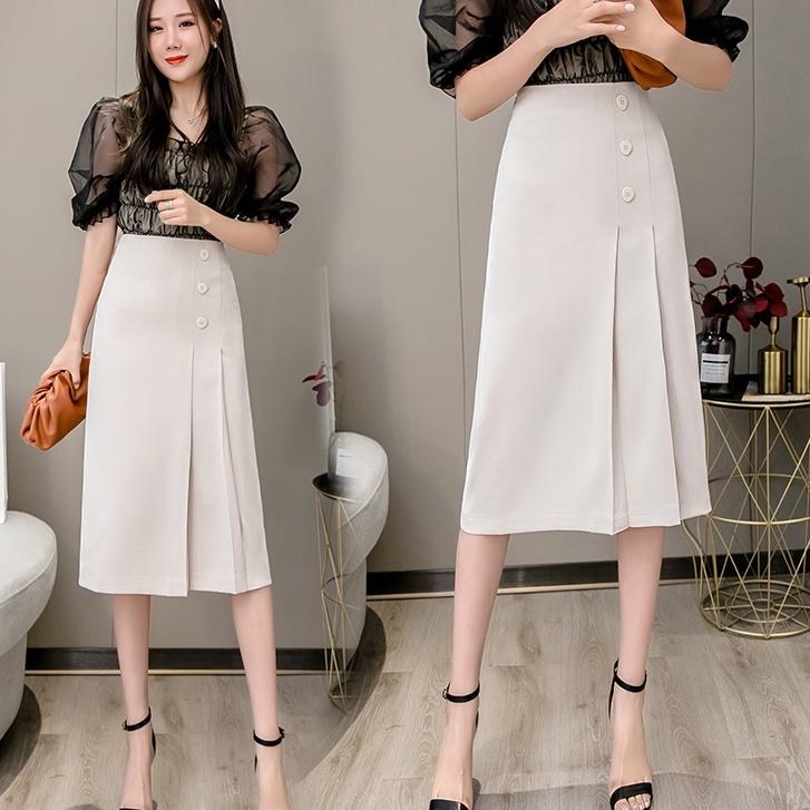 Chân váy dài chữ a xếp ly dài qua gối, chất vải mềm kiểu dáng công sở
