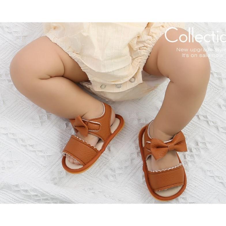 Giày sandal tập đi cho bé đế cao su chống trơn trượt chất da mềm cực chất đính nơ dễ thương cho b