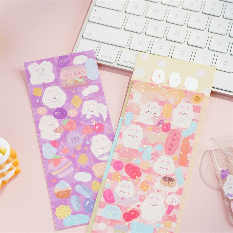 Hai miếng stickers gấu thỏ được cán lấp lánh dùng để trang trí sổ tay top loader