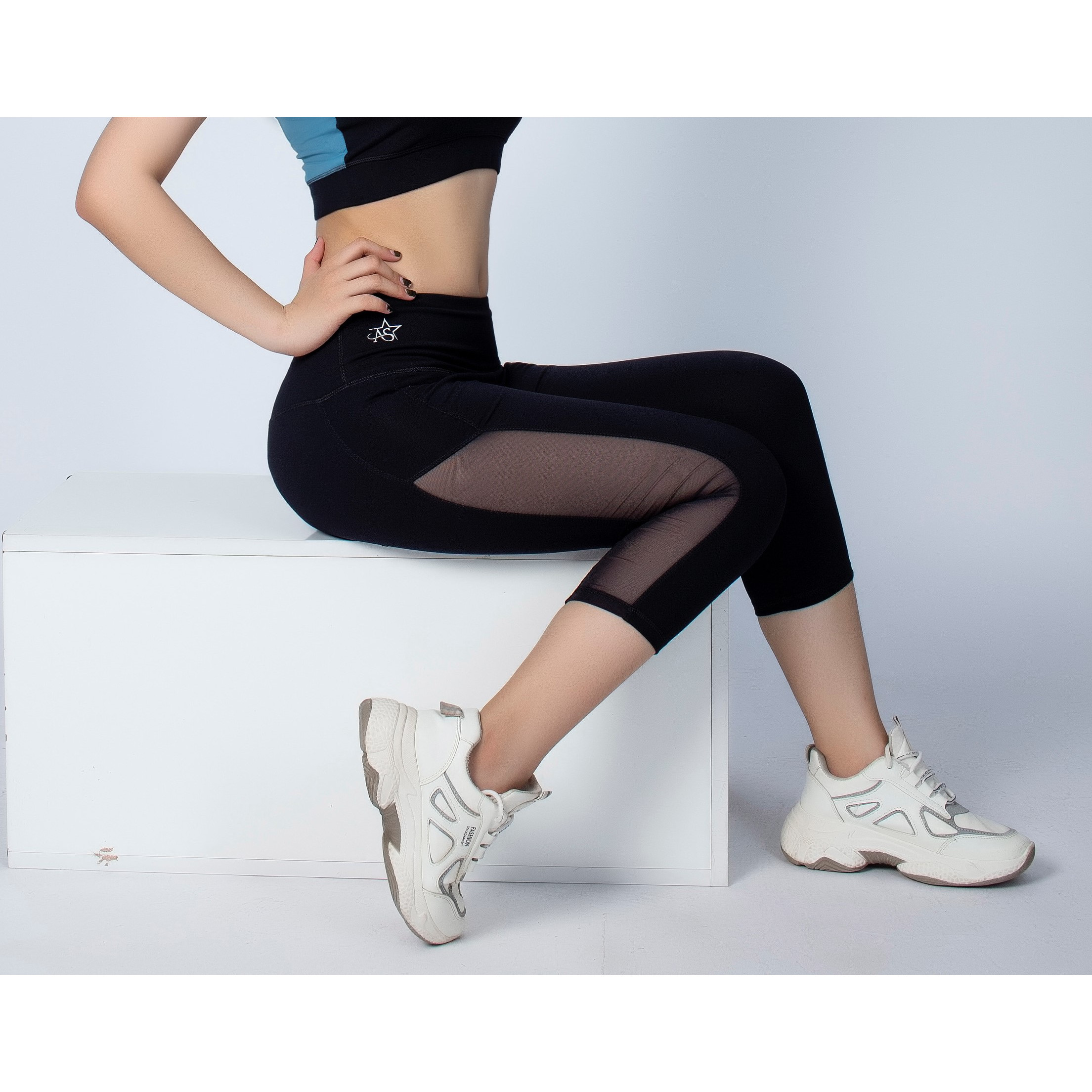 Quần tập legging lửng thể thao nữ phối lưới dọc thoáng khí