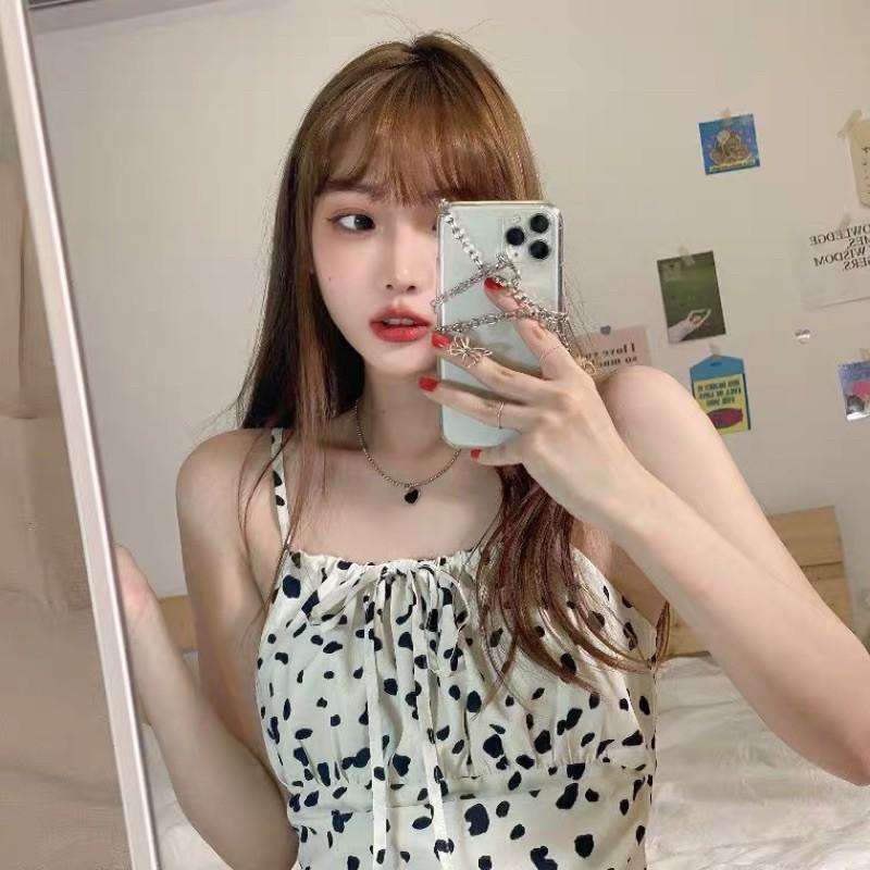 Đầm hai dây thắt nơ hoạ tiết bò sữa trend 2021