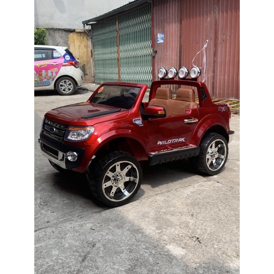 Ô tô xe điện trẻ em địa hình FORD RANGER XLS 2 chỗ 4 động cơ ghế da sơn tĩnh điện ( Đỏ-Đen-Trắng-Xanh)