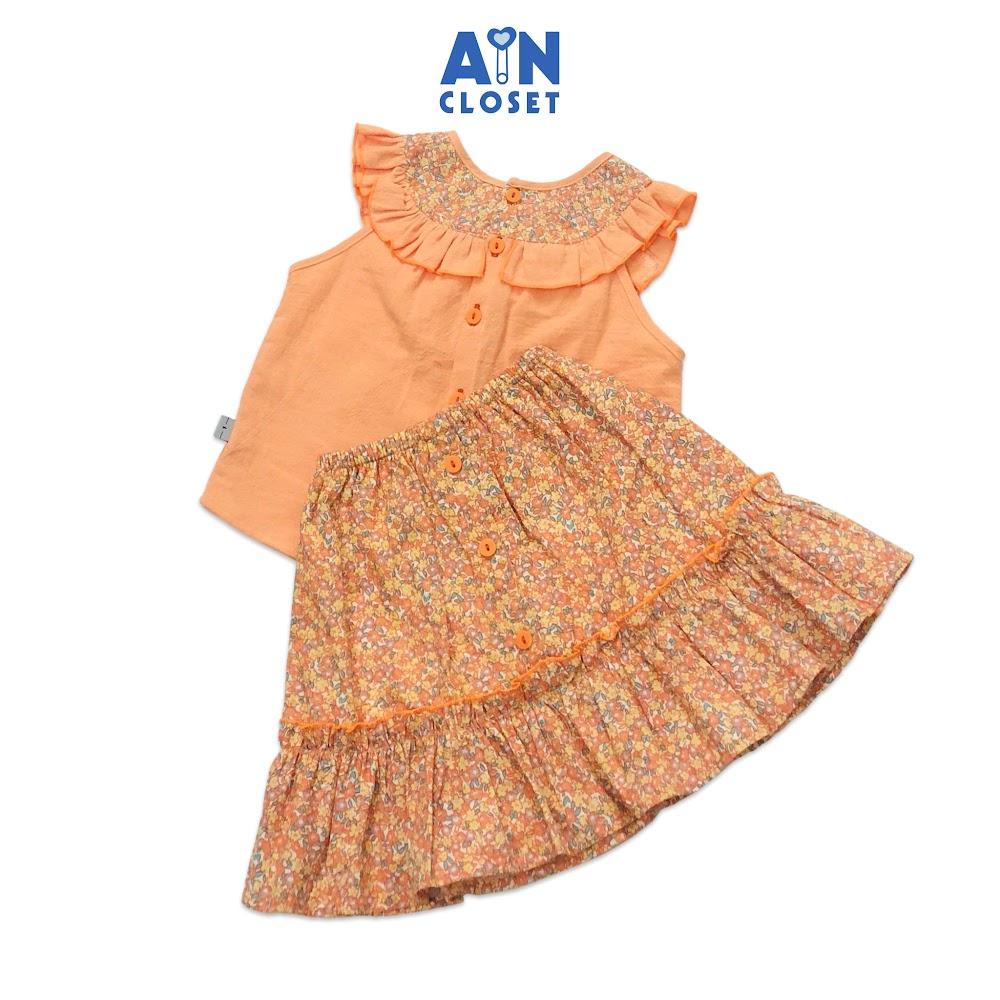 Hình ảnh Bộ áo váy ngắn bé gái họa tiết Hoa nhí cam nhiệt đới cara - AICDBGMAC07U - AIN Closet