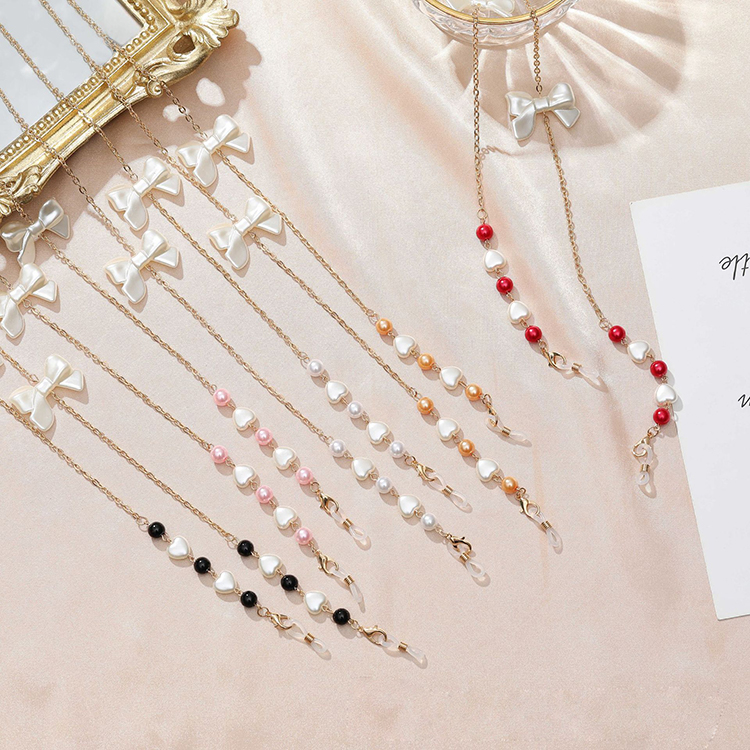 Dây kính chuỗi dây chuyền đeo gọng kiếng đeo khẩu trang mix nơ và trái tim phong cách thời trang nổi bật hot girl