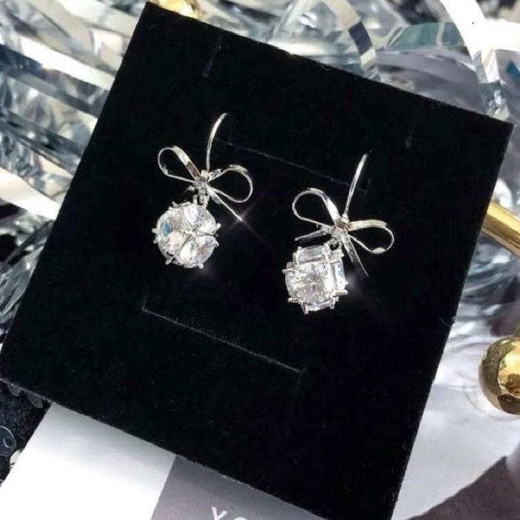 Bông tai nữ dáng nơ khối cầu lấp lánh