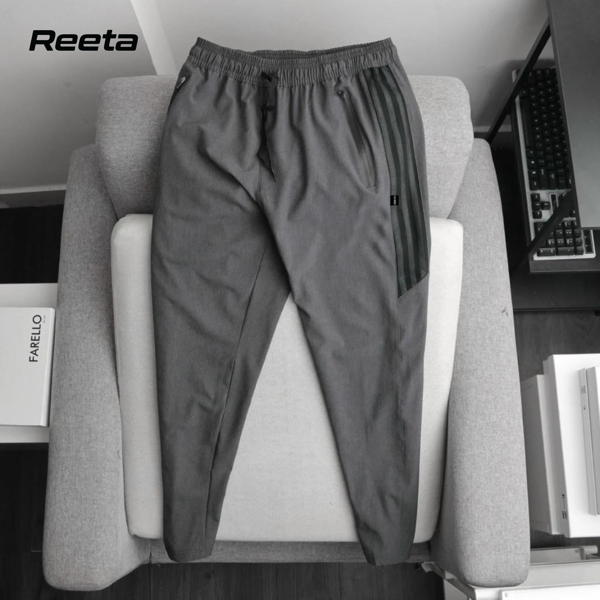 Quần dài thể thao nam REETA, chất vải gió mềm mịn, phối lưới phần hông trẻ trung thể hiện phong cách mạnh mẽ - A1482