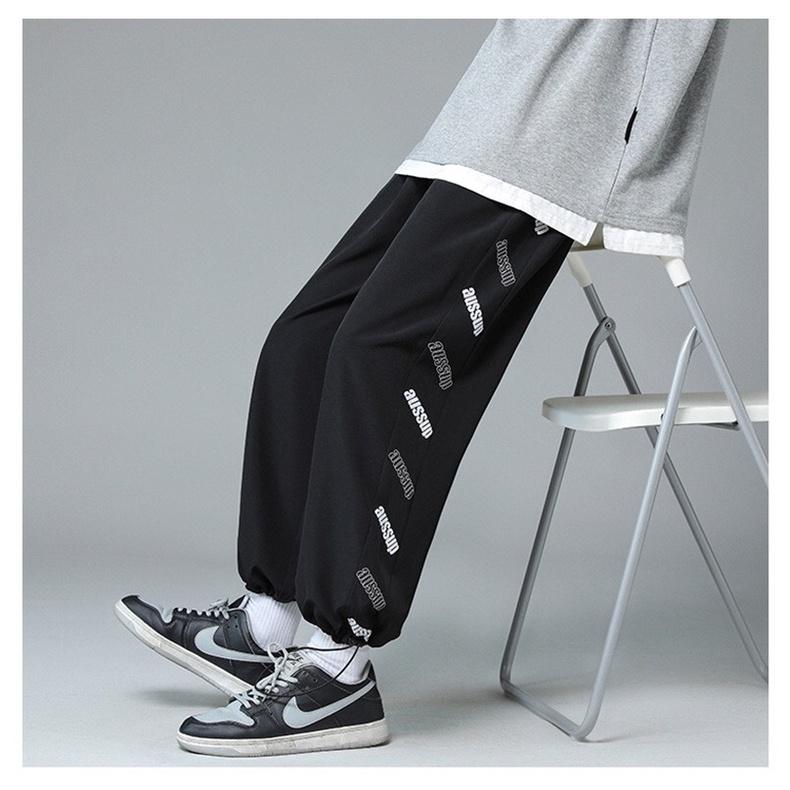 Quần jogger unisex ́ ̉ ̣̂ Quần ống rộng có dây rút ở gấu chất Umi thể thao, chất lì không xù