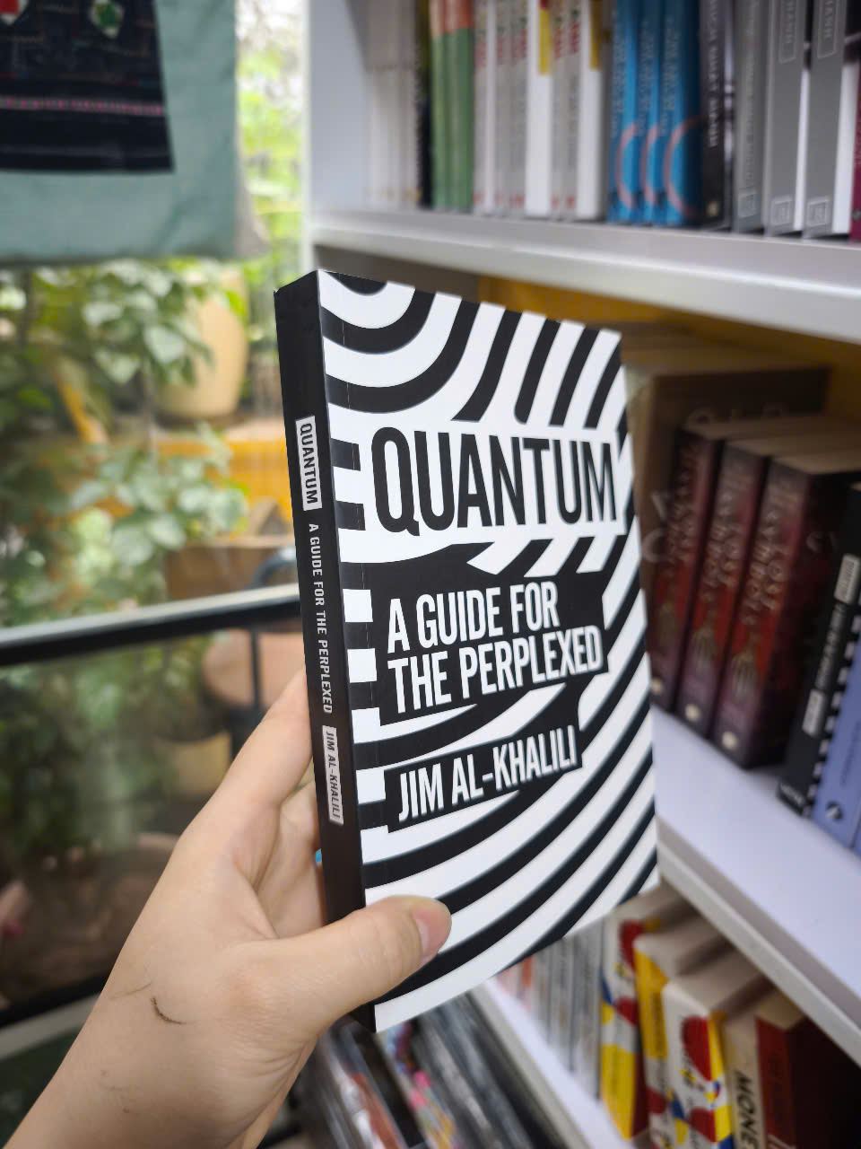 Sách - Quantum: A Guide For The Perplexed by Jim Al-Khalili - Science/ Nonfiction/ Physics in English