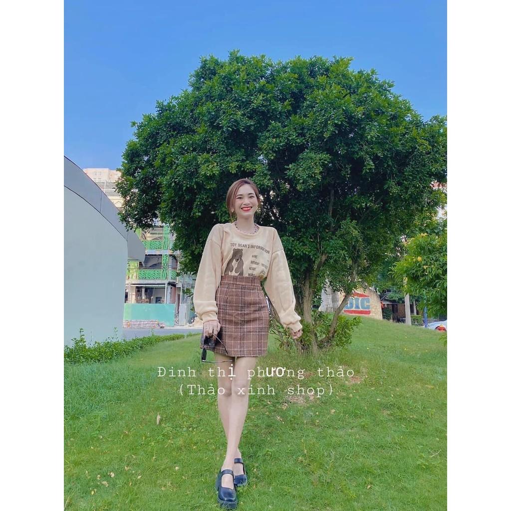 Chân váy kẻ chữ A