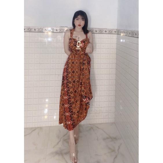 Đầm maxi hoạ tiết thổ cẩm hai dây khoét eo có túi hai bên