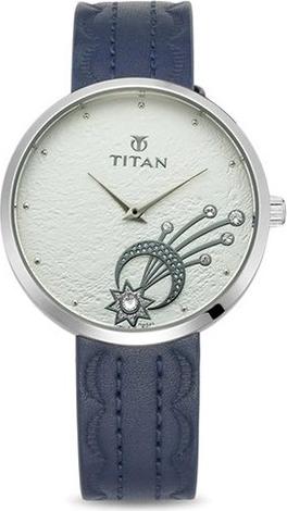 Đồng hồ đeo tay hiệu Titan 95083SL01; kèm bộ trang sức gồm 4 bông tai và hộp