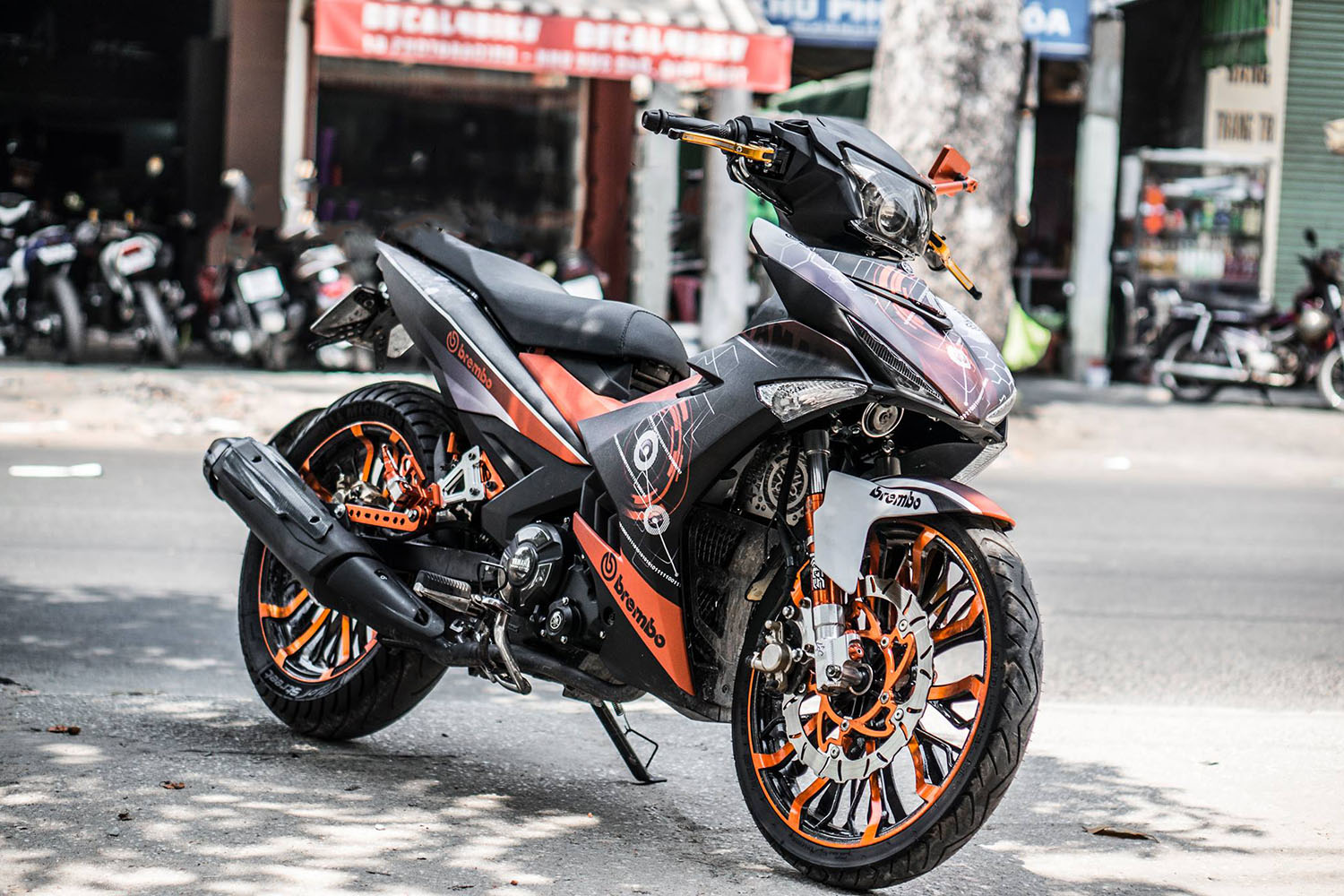 Tem trùm Exciter 150 Orange Electric