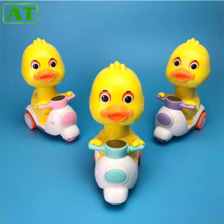 Đồ chơi trẻ em vịt con chạy xe vespa
