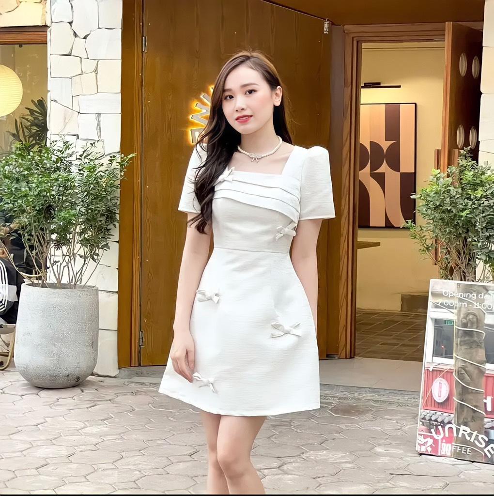 Đầm xòe tapta vân đá cổ vuông đính nơ