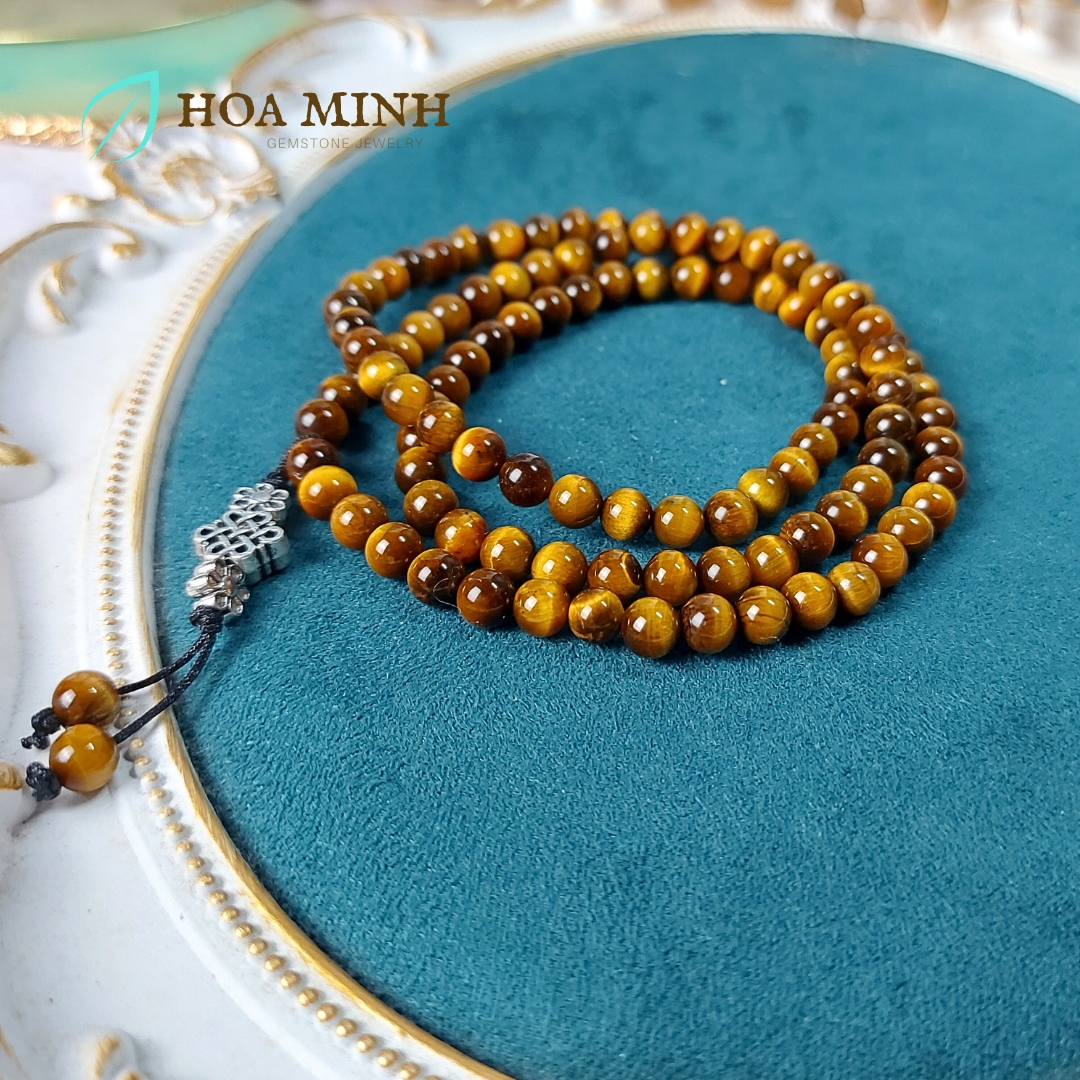 Vòng tay đá Mắt Hổ vàng nâu VIP 5A tự nhiên chuỗi 108 hạt size 6 li phối charm cát tường hoa mai bình an, lộc phát