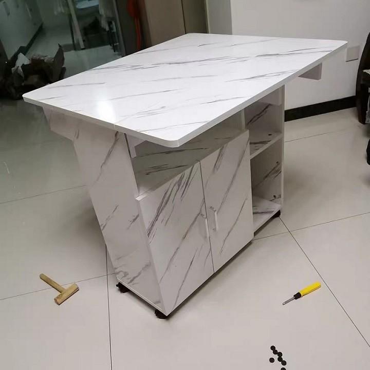 Bàn ăn gấp gọn thông minh tích hợp tủ để bát, gia vị kích thước sử dụng 120*70*77cm.