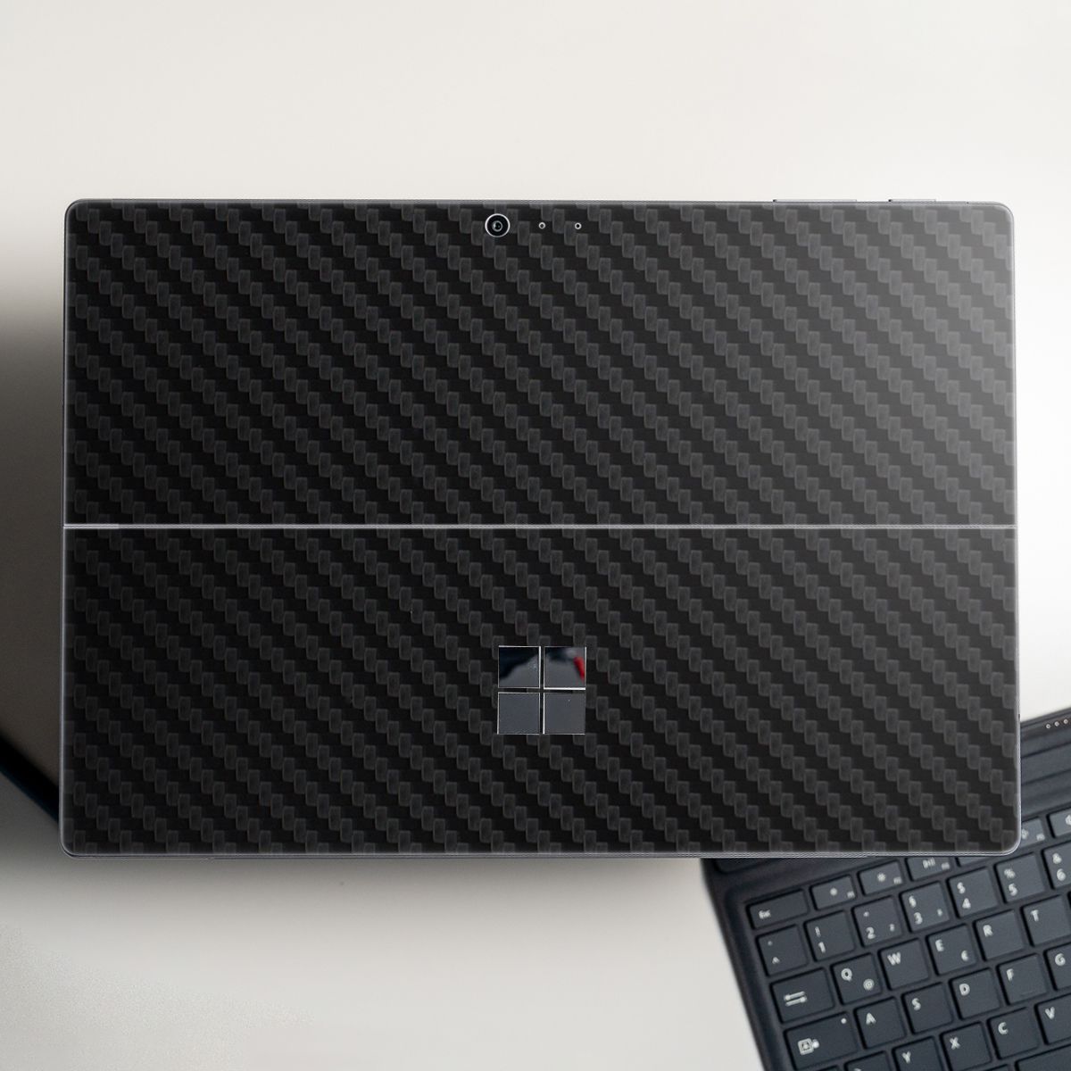 Skin dán hình Aluminum Chrome đen carbon cho Surface Go, Pro 2, Pro 3, Pro 4, Pro 5, Pro 6, Pro 7, Pro X