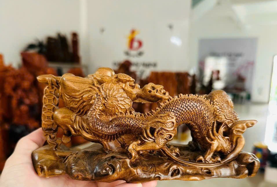 TƯỢNG PHẬT DI LẶC KÉO BAO RỒNG BẰNG GỖ BÁCH XANH THƠM NỨC KT NGANG 20CM