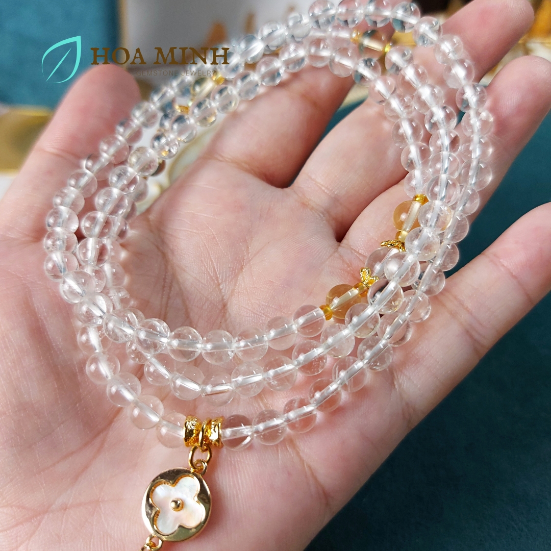 Vòng chuỗi 108 hạt Thạch Anh Trắng pha lê size hạt 6 li phối charm cỏ 4 lá và bướm nhỏ đính đá, ốp hoa, thạch anh vàng