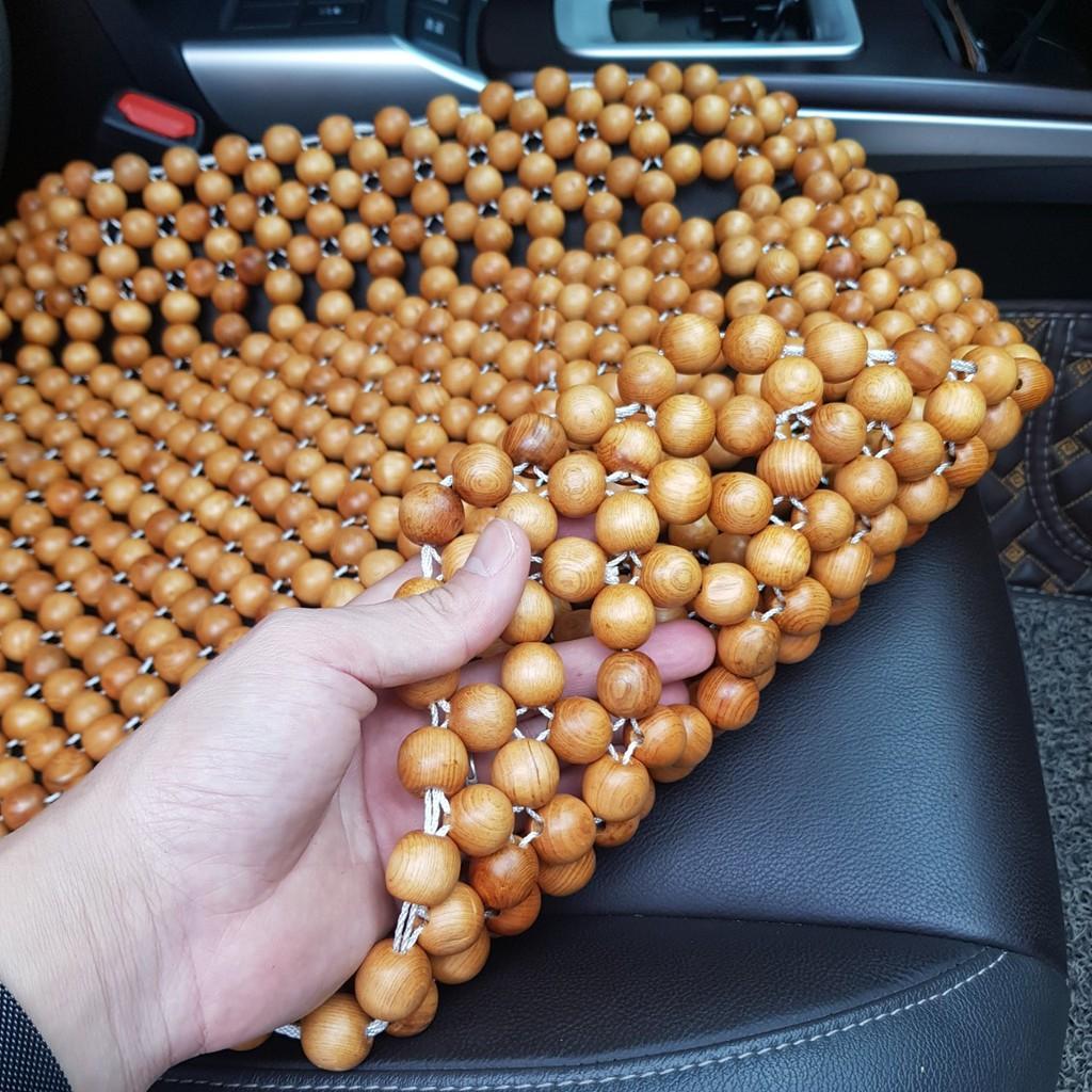 Đệm lót ghế ô tô hạt gỗ Pơ Mu 100% tự nhiên tựa lưng massage trên ô tô