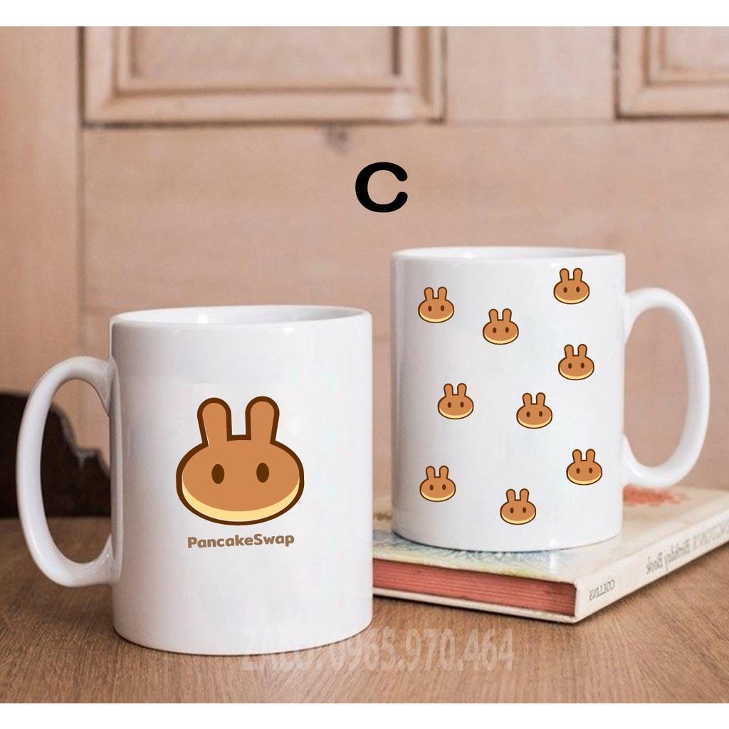 Ly Sứ Có Quai Họa Tiết Đồng Coin PANCAKESWAP - In hình lên ly sứ, cốc theo yêu cầu của bạn - IN HÌNH LỚP, CÔNG TY