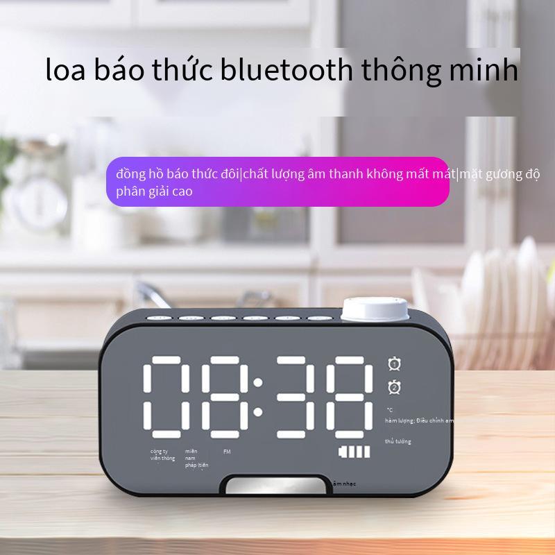 Phong cách mới nhất loa Bluetooth di động không dây loa siêu trầm mini âm thanh máy tính để bàn gương đồng hồ đồng hồ báo thức thẻ đài phát thanh