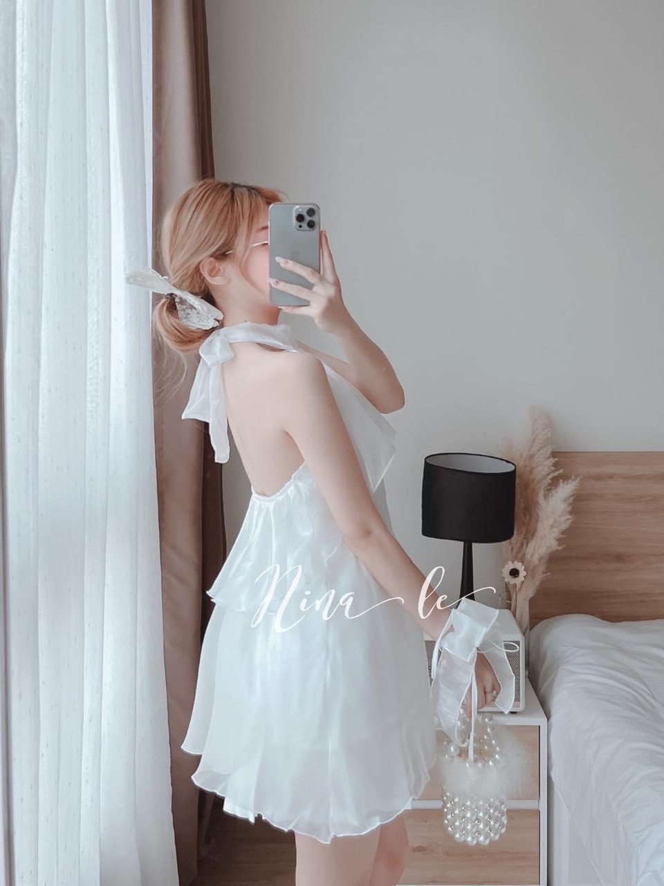 Set áo yếm xếp tầng bèo cột nơ sau kèm chân váy dập ly có lót có nơ tay, set áo váy đi chơi Ánh Dương Clothing M202