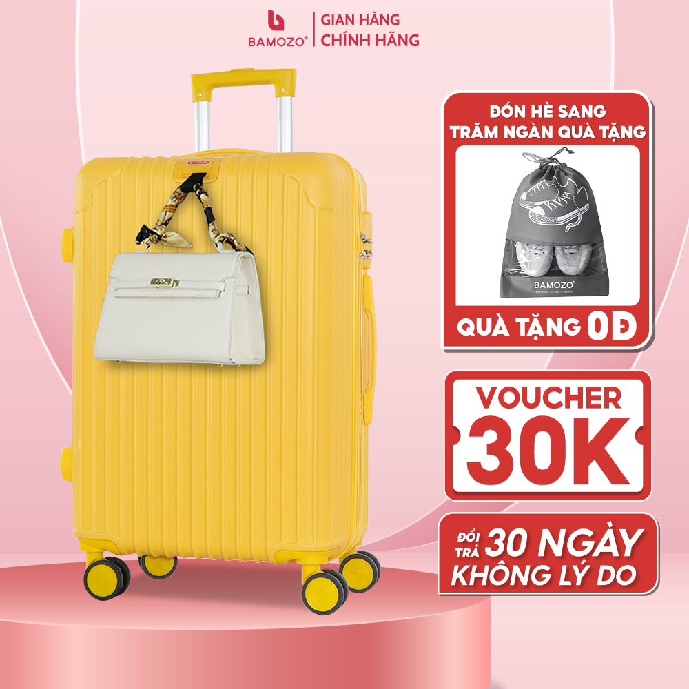 Vali du lịch BAMOZO 8801 MÀU VÀNG size 20/24, vali kéo nhựa được bảo hành 5 năm. 
